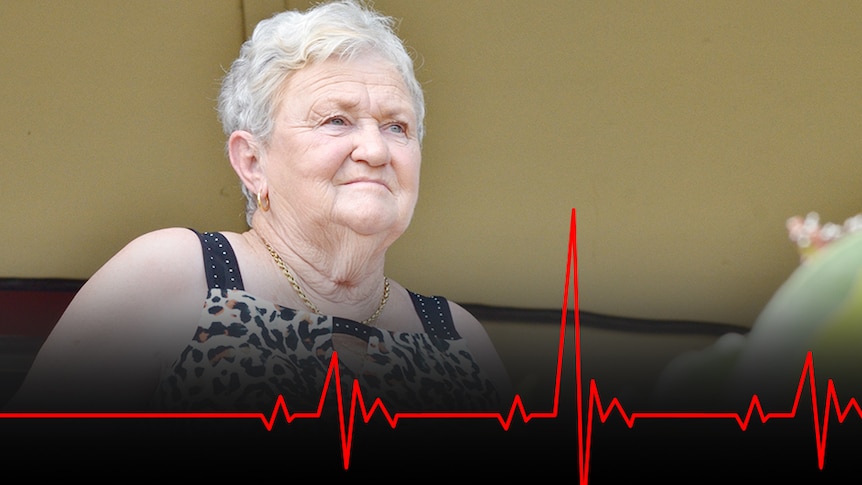 A woman with a graphic image of a heartbeat