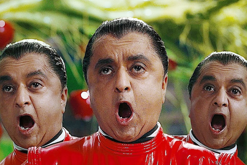 Three versions of Deep Roy singing in Charlie and the Chocolate factory.