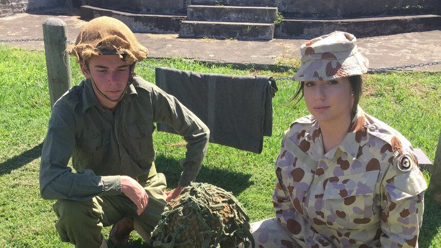 Tom Bruun and Rebecca Cooper check out the gear the ANZAC's used to carry.