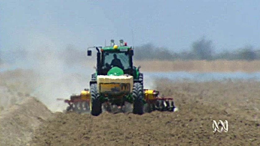 A tractor plows the ground in the Murray-Darling Basin