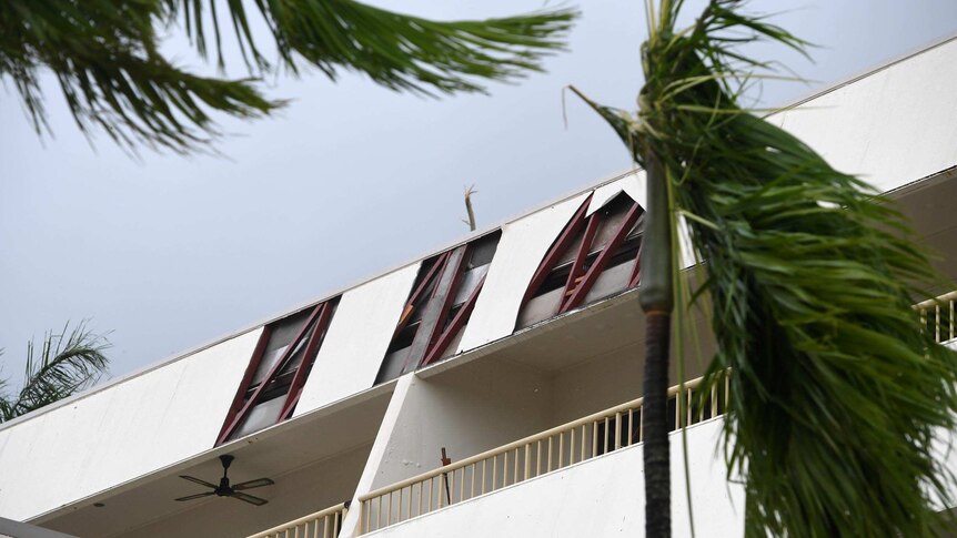 Storm damage to a hotel is seen at Airlie Beach on Tuesday evening
