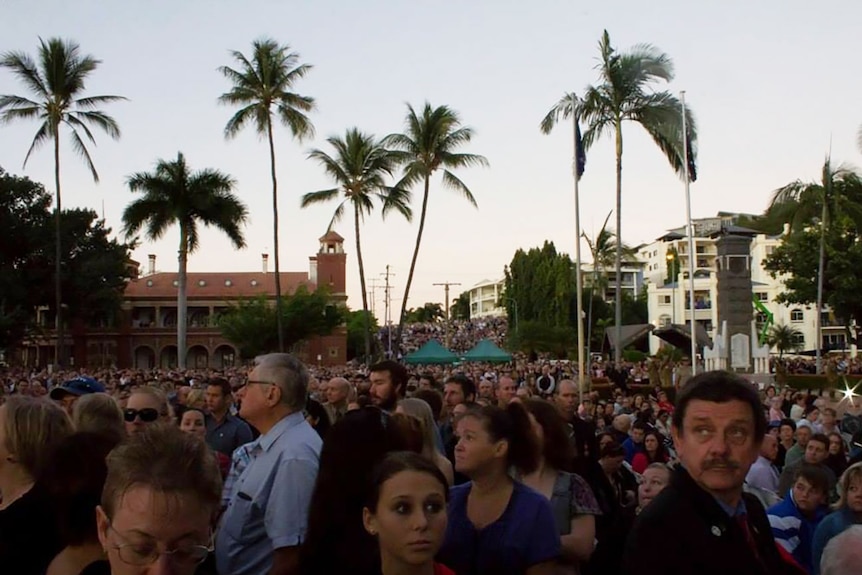 Thousands of people pack into the centre of Townsville for the dawn service