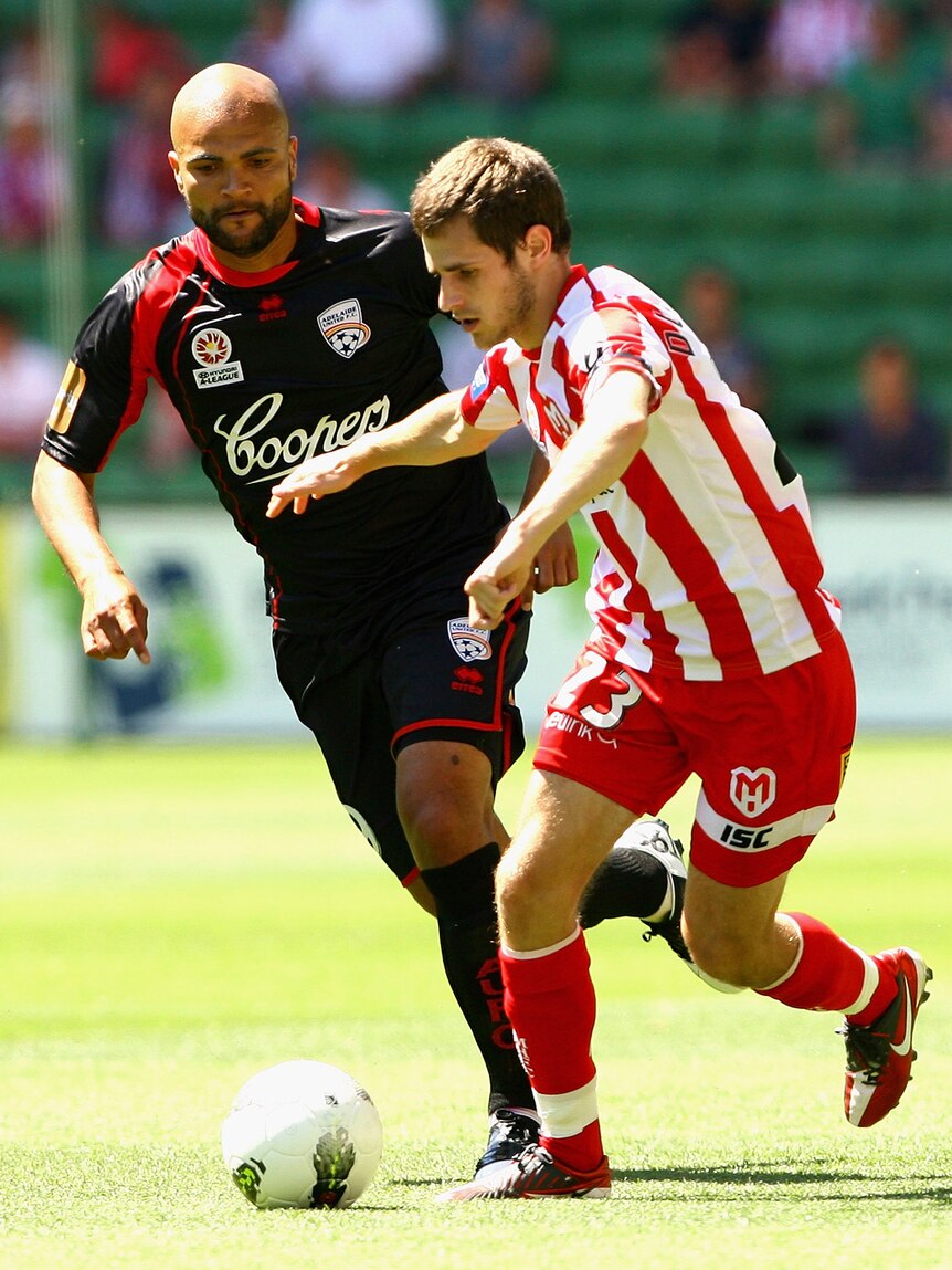 Two goals from Sergio van Dijk (l) helped Adelaide United to a 3-1 win over the Heart in Melbourne