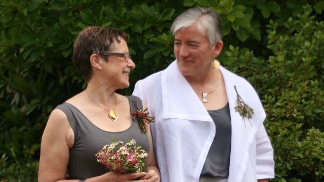 Two women in a wedding photo.