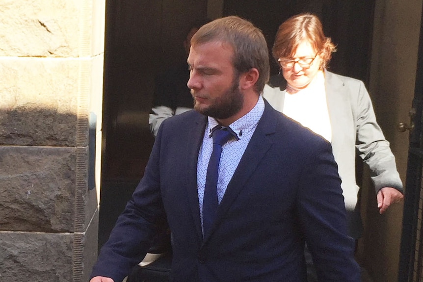 Joby Rowe walks out of court.