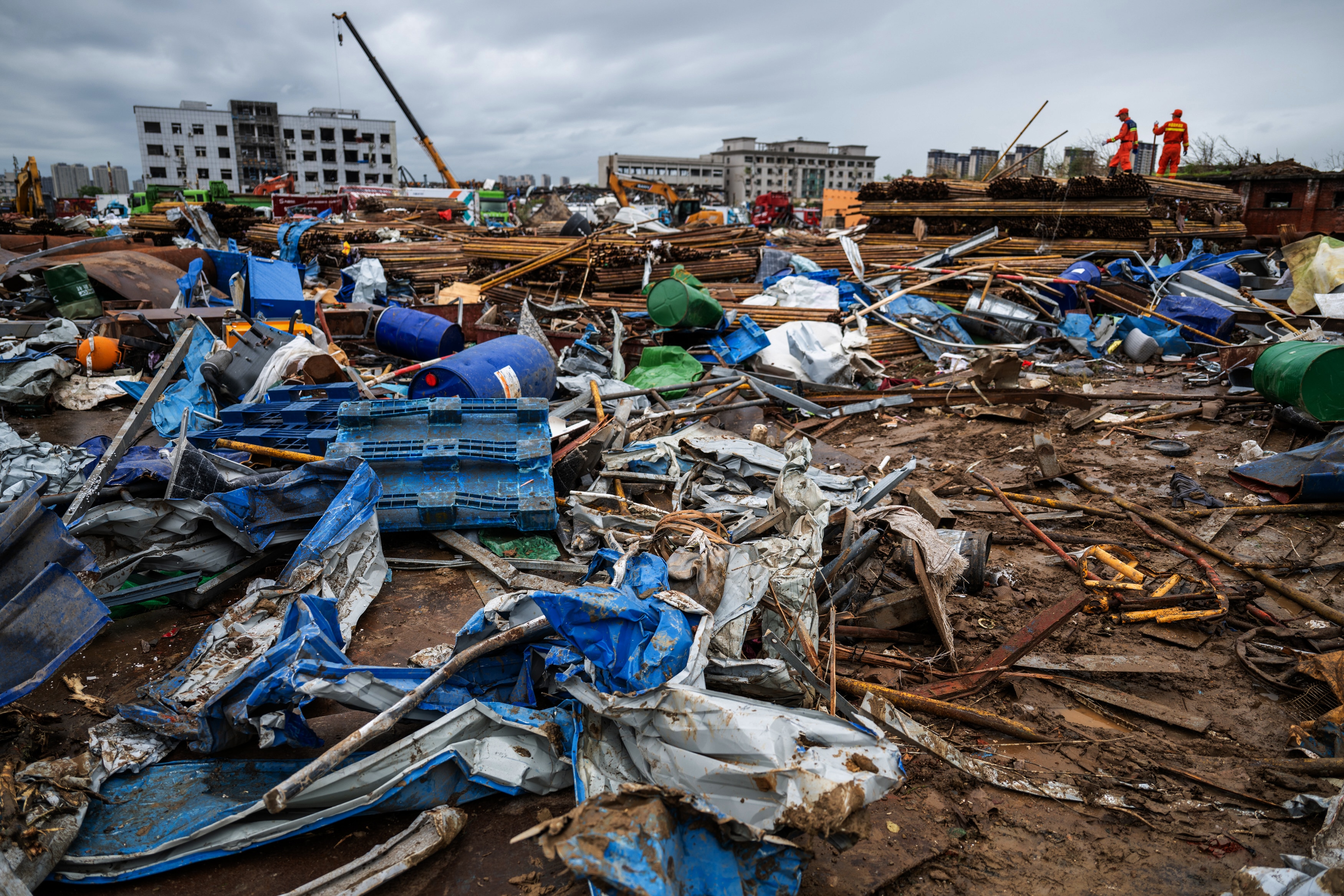 Debris and rubbish is scattered across the ground.