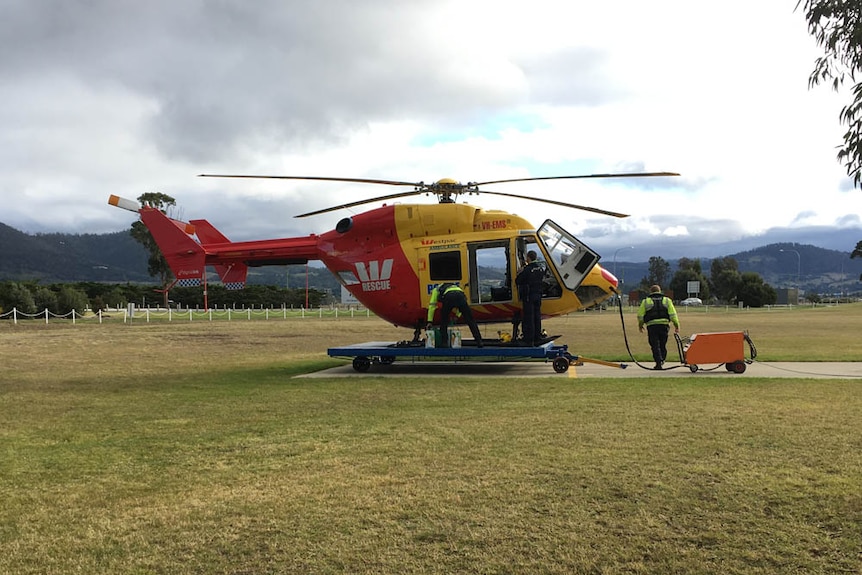 Rescue helicopter with supplies