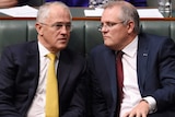 Malcolm Turnbull and Scott Morrison, seated, talking in Question Time