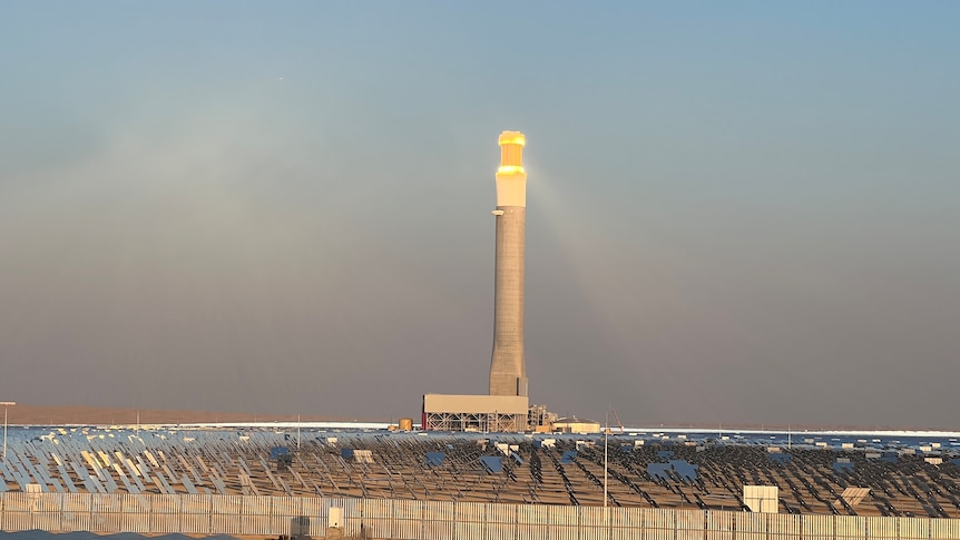 The 250 metre-tall tower in the middle of Noor Energy solar plant.