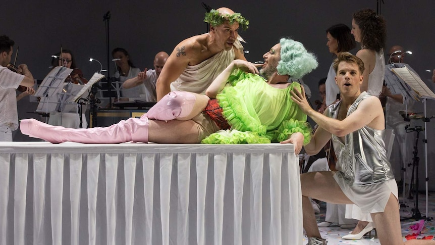 A scene from Pinchgut Opera's 2021 production of Platee by Rameau L-R: Citheron, Platee (reclining) and Mercury.