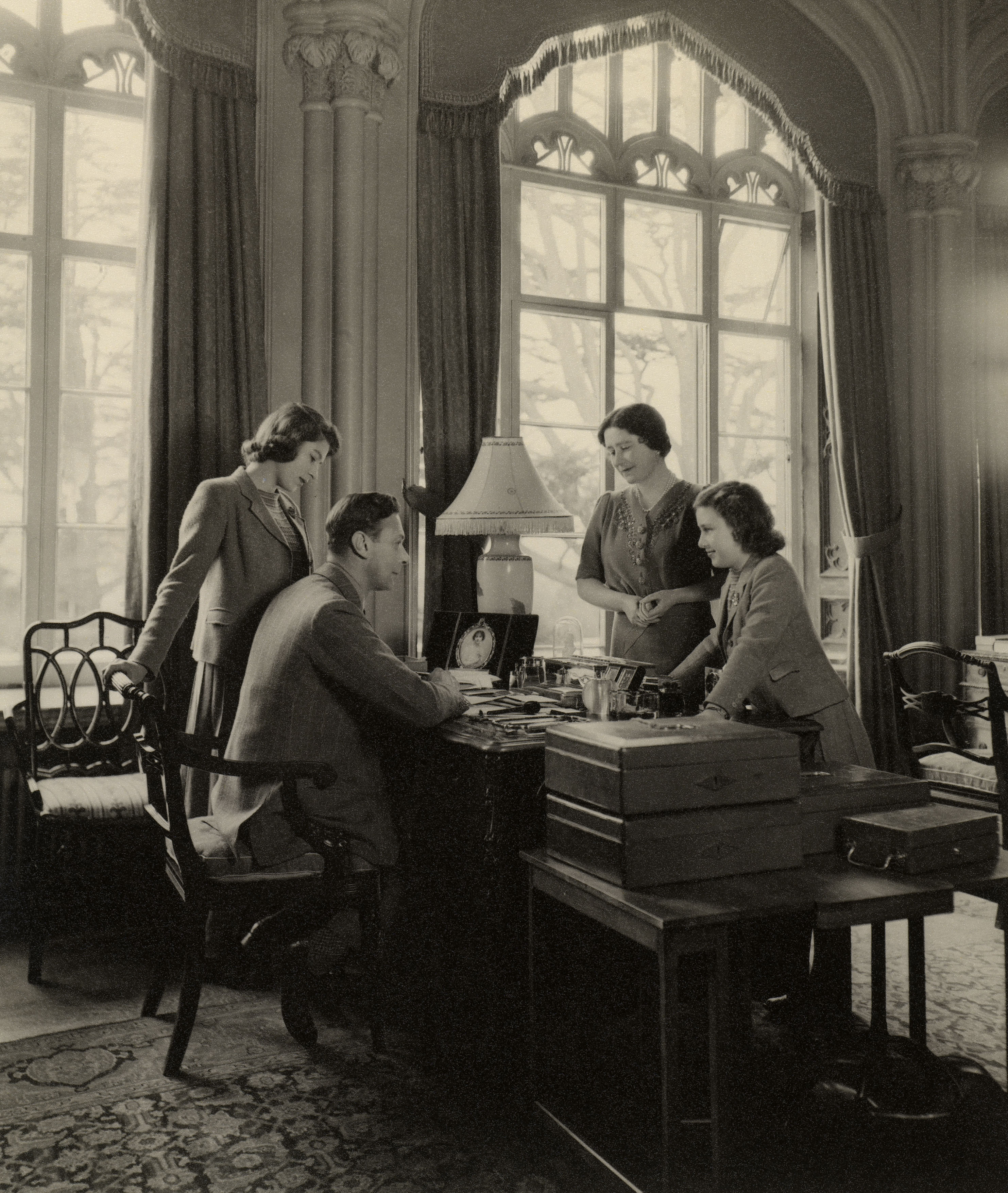 Then-Princess Elizabeth, King George VI, the Queen Mother and Princess Margaret at Royal Lodge in 1943
