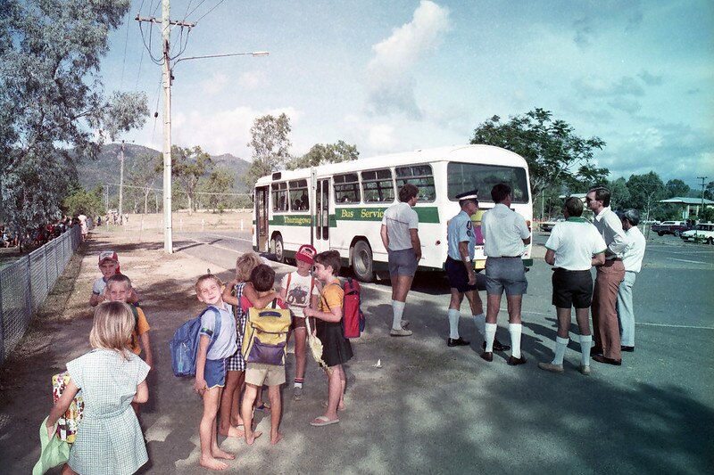 school children waiting for the school bus in outback Qld 
