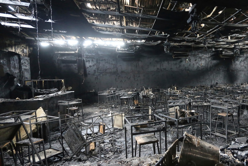The burnt out interior of a nightclub.