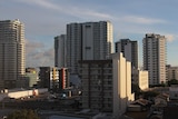 A photo of inner-city apartment buildings in Darwin at sunrise.