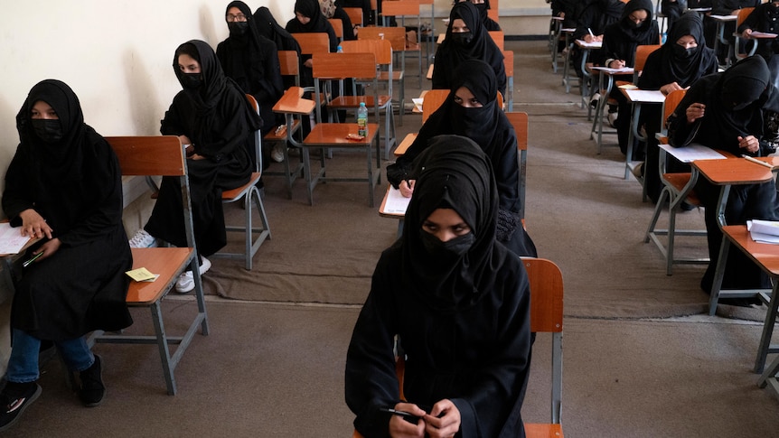Afghan female students take entrance exams at Kabul University.