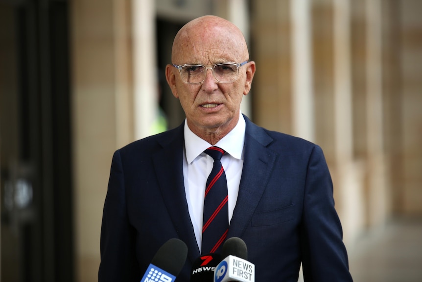 John Quigley speaks to journalists outside the WA Parliament.