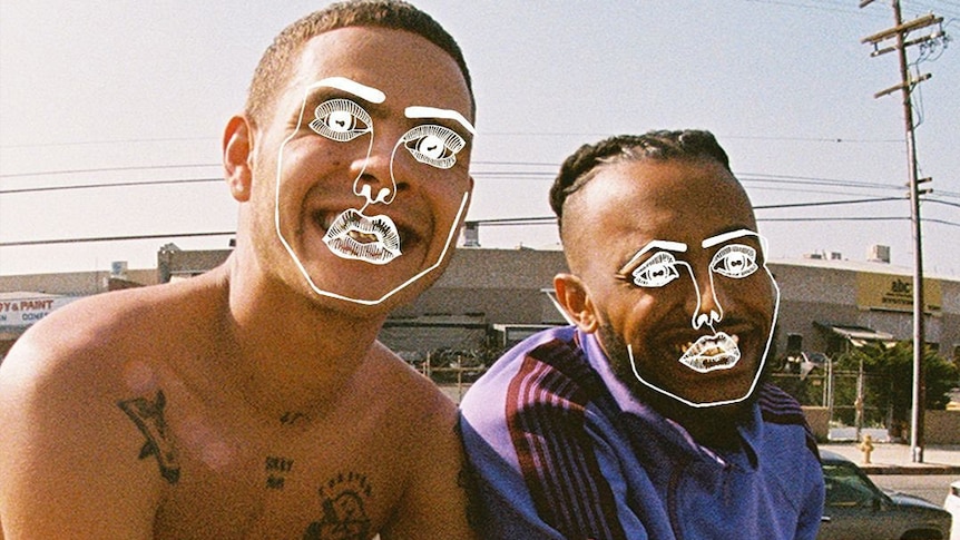 A press shot of slowthai and Amine with the signature 'Disclosure' face on the set of the music video for 'My High'