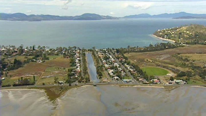 Aerial shot Lauderdale Canal Tasmania from TV News