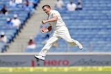 Steve O'Keefe celebrates the dismissal of India captain Virat Kohli on day three.