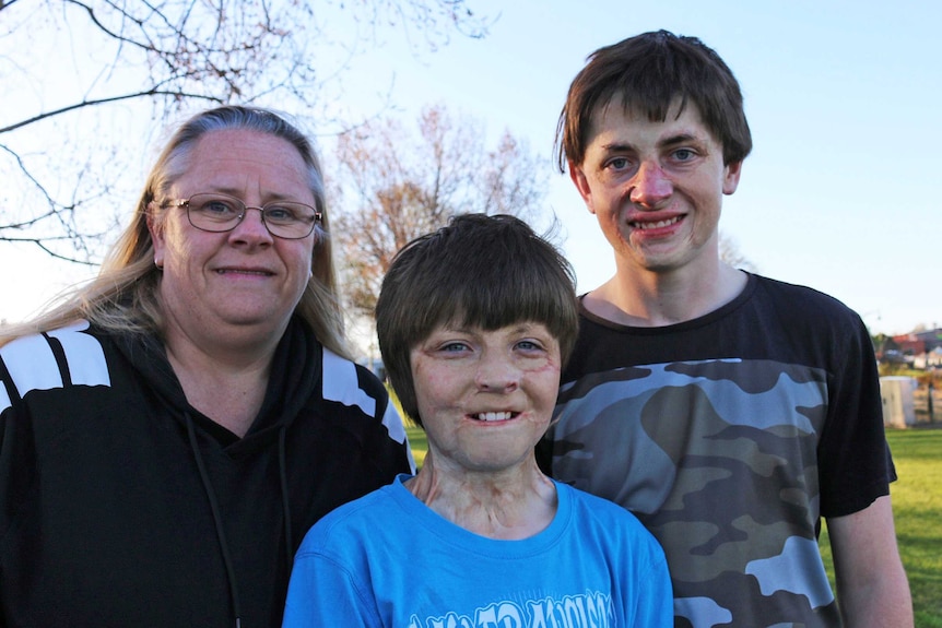 Alison McGee and her sons Spencer and Fletcher Connelly smile for the camera.