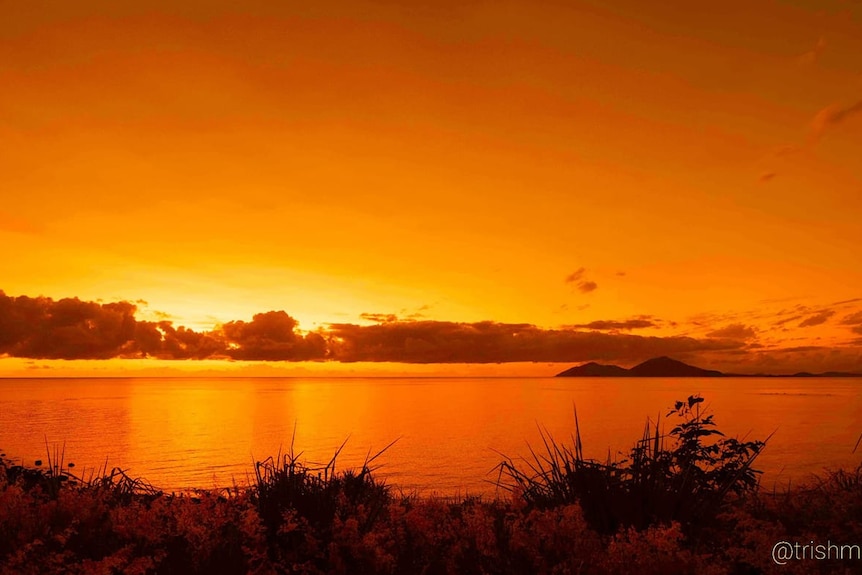 Beautiful golden sunset over ocean