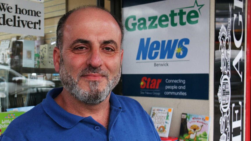 Tony Melhem standing outside a news agency in Berwick, Victoria.