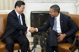 Xi Jinping and Barack Obama have traded blows over their economic policies.