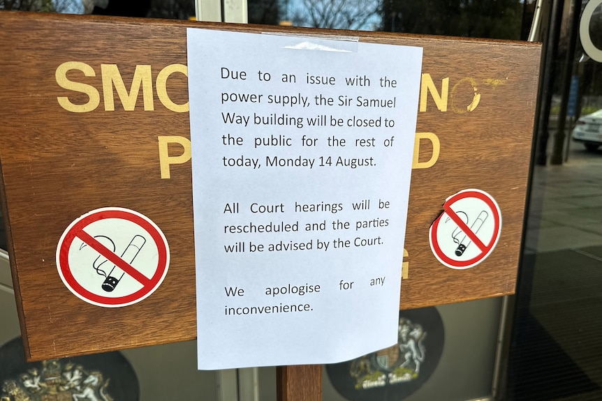A note posted out the front of an Adelaide court building.