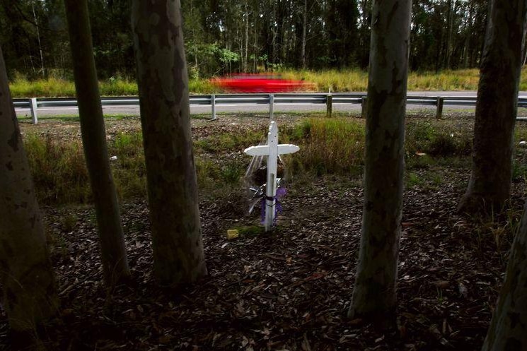 A memorial cross marks another road fatality