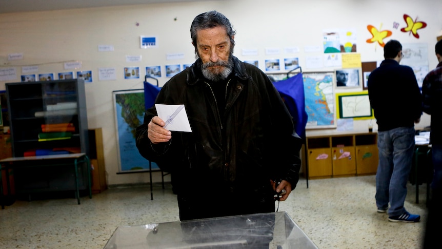Man casts vote in Greek election