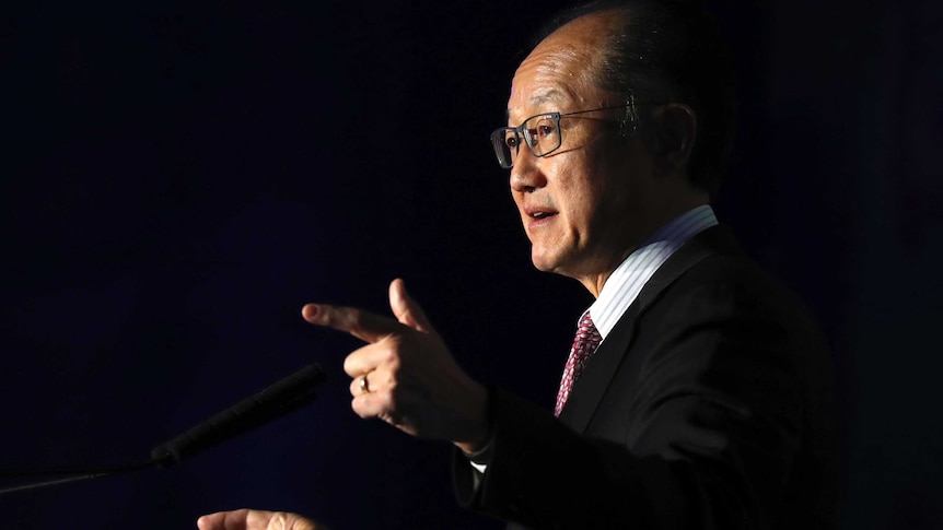 World Bank president Jim Yong Kim gestures as he speaks at a conference.