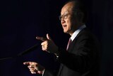 World Bank president Jim Yong Kim gestures as he speaks at a conference.