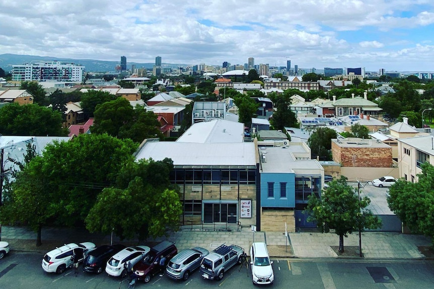 A photo of buildings and a city in the distance