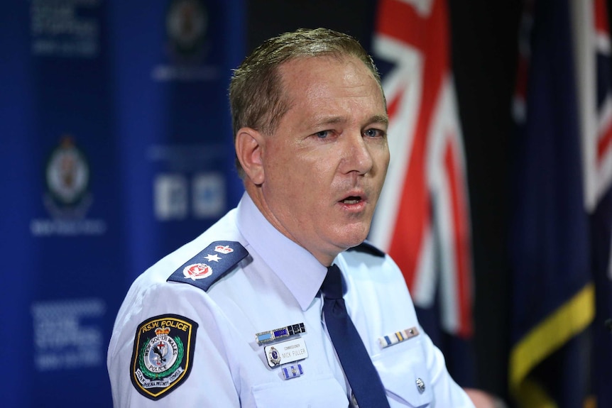 police officer at a press conference