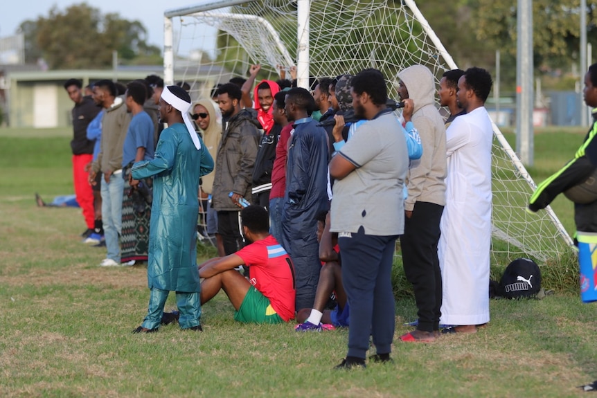 Spectators on the sideline to watch teams compete in the Ramadan Cup. 