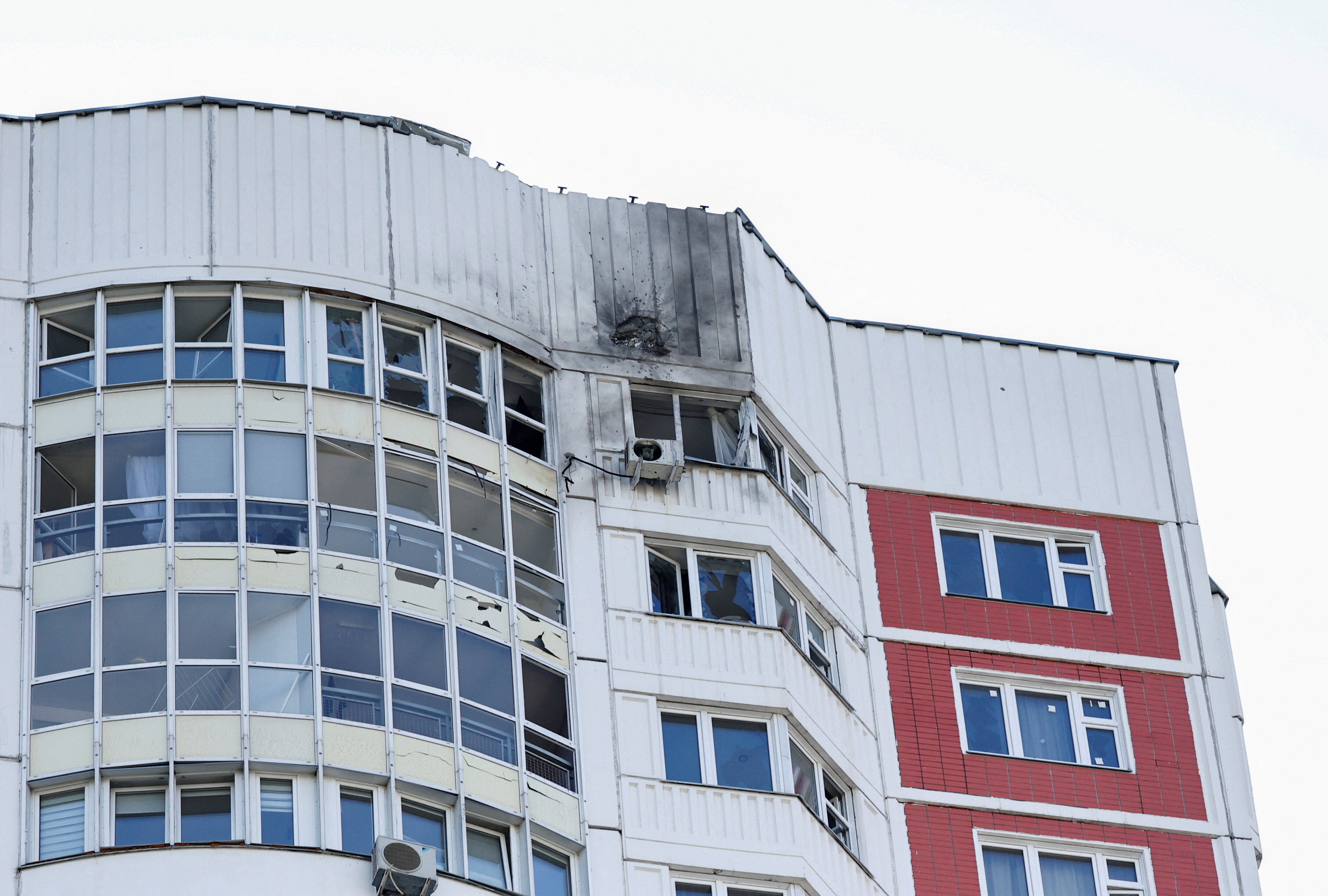 A damaged multi-storey apartment block following a reported drone attack in Moscow.