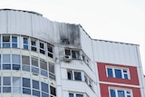 A damaged multi-storey apartment block following a reported drone attack in Moscow.