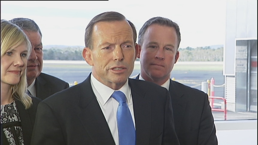 Tony Abbott took his campaign to Hobart International Airport