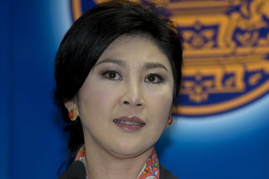 Yingluck Shinawatra answers questions from the media