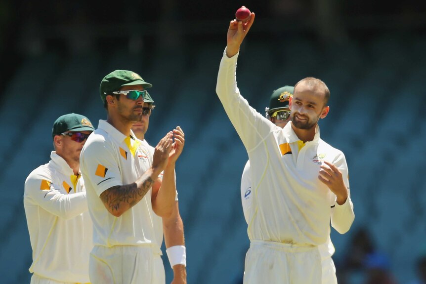 Nathan Lyon celebrates his five-wicket haul