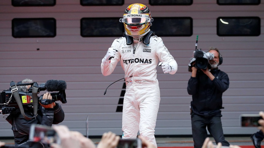 Lewis Hamilton celebrates his win at the Chinese Grand Prix