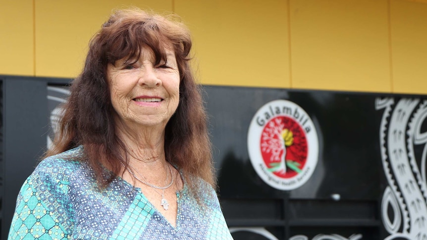 Indigenous elder Kerrie Burnet in front of Galambila Aboriginal Health Service