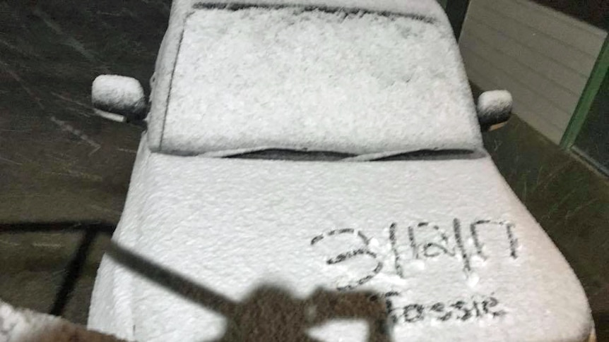 Summer snow on a car at Great Lake in Tasmania