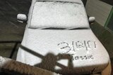 Summer snow on a car at Great Lake in Tasmania