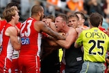 Lance Franklin and Steve Johnson in a scuffle