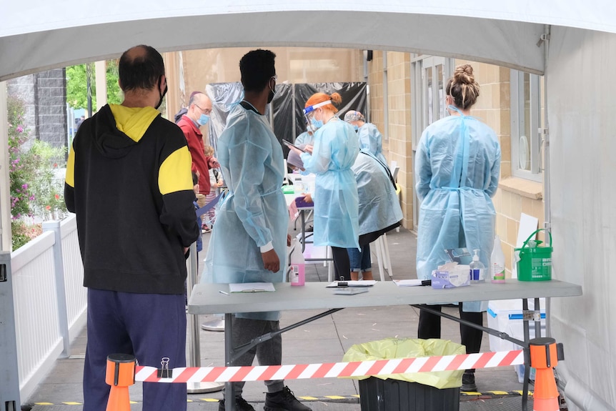 A photo of people being tested for coronavirus at a pop-up testing centre in Heidelberg West.