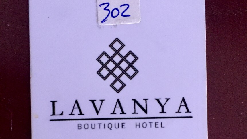 A white card saying Lavanya Boutique Hotel.