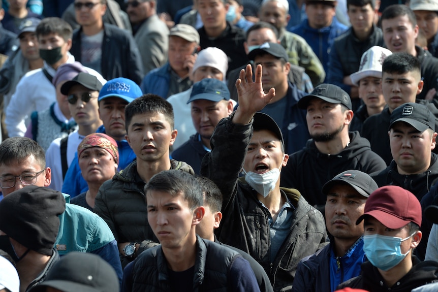 A man gestures at a rally in the central square of Bishkek, Kyrgyzstan