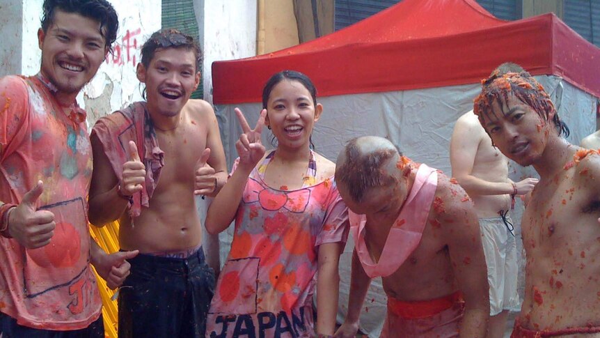 Revellers after La Tomatina festival