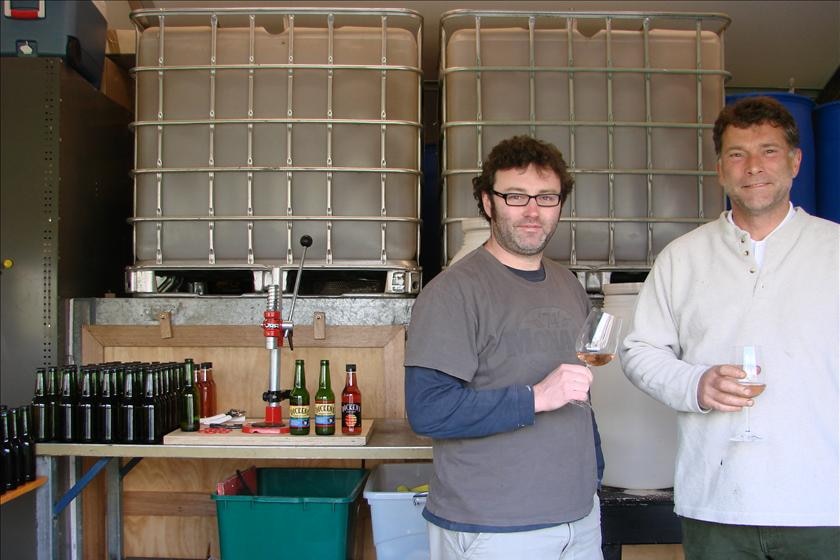 Corey Baker and John Dickens making cider at their Leam cool store in Tasmania's Tamar Valley